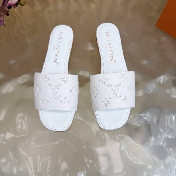 Шлепанцы Louis Vuitton