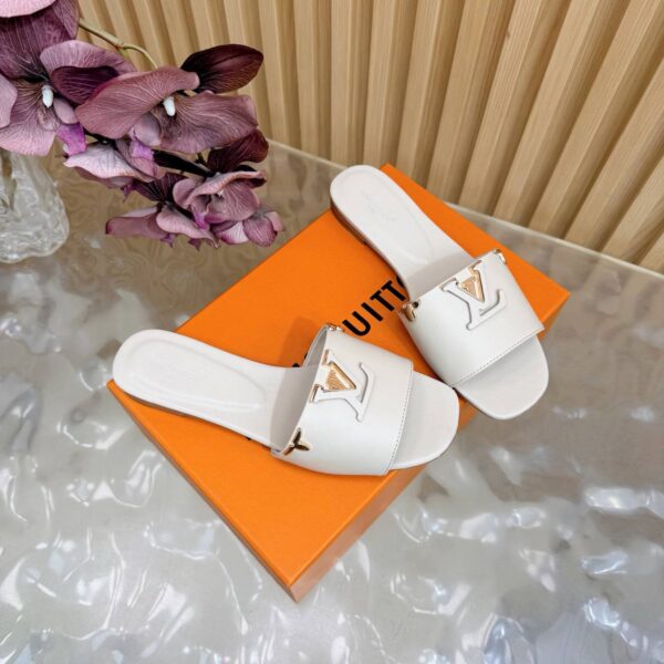 Шлепанцы Louis Vuitton