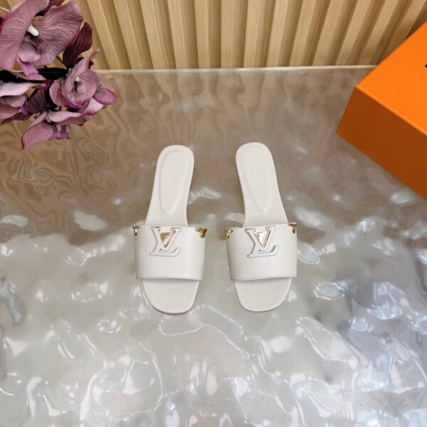 Шлепанцы Louis Vuitton