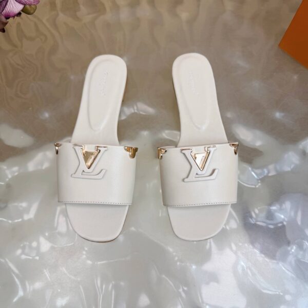 Шлепанцы Louis Vuitton