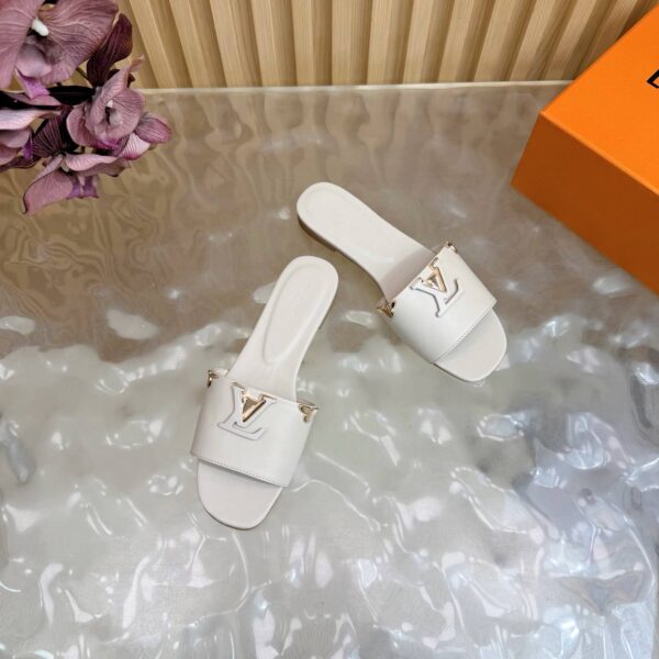Шлепанцы Louis Vuitton
